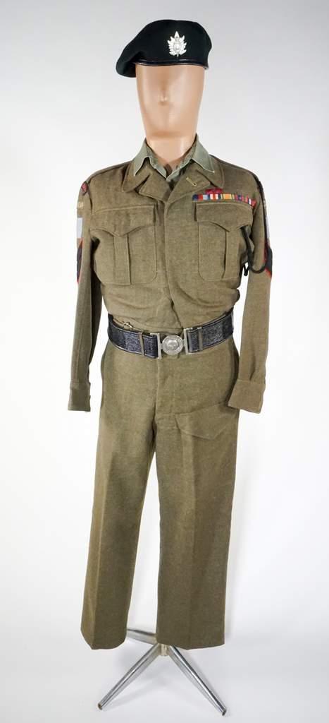 A mannequin wearing a WWII soldier’s uniform with the insignia of the  Queen’s Own Rifles.