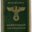 A small, softcover green booklet with the German eagle on top of a swastika  symbol on the cover.