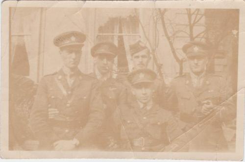 A sepia-toned photograph of Byron Cooper Sisler posing with soldiers from his  Air Force class.